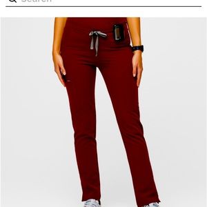 Figs: yola tall skinny , burgundy , size large/tall. Excellent condition.